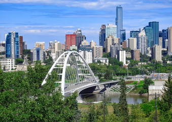The Walterdale suspension bridge with downtown view in Edmonton, Alberta, Canada