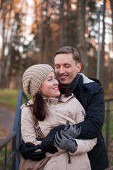girl with   guy in autumn  park