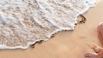 New Year 2019 written on sand beach and ocean wave. lettering on the beach. Happy New Year 2020.