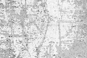 Texture of a concrete wall with cracks and scratches which can be used as a background