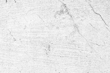 Texture of a concrete wall with cracks and scratches which can be used as a background