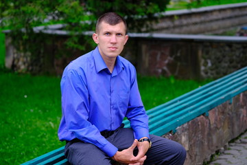 Obraz premium Seriously fashion man in shirt. Lifestyle Outdoor street photo