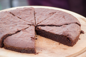 brownie chocolate cake in  wooden plate