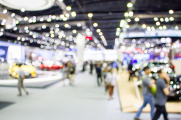 blurred people in motor show