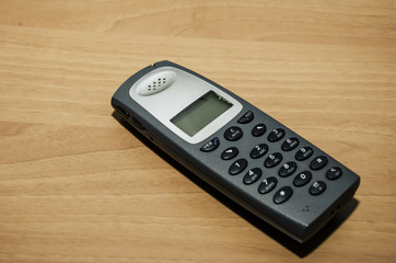 office cordless telephone on the table. Close-up.