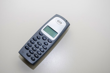 office cordless telephone on the table. Close-up.