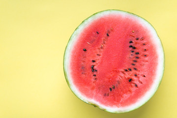Half of watermelon, fresh colorful fruit background