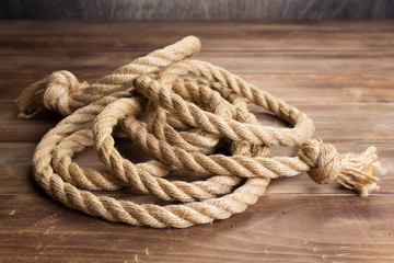 ship rope at wooden board background