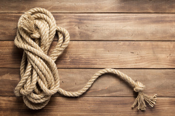 ship rope at wooden background texture