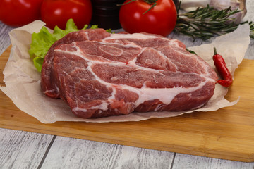 Raw pork neck steak