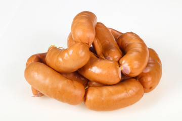 Tasty meat sausages over white background