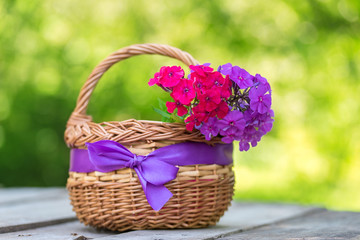 Fototapeta na wymiar Beauty flowers in basket