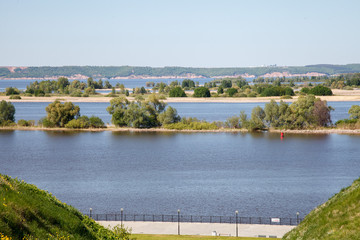 Obraz premium beautiful summer landscape. view of the wide river with Islands from the high Bank