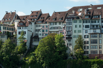 Fototapeta na wymiar Panorama of historic houses in border rhine river in Basel - Switzerland