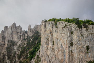 Ai-petri mountain in the fog. High mountain. Crimea. Russian mountains. Low clouds. Beautiful mountain landscape. The famous AI Petri mountain, partially covered with clouds, fog