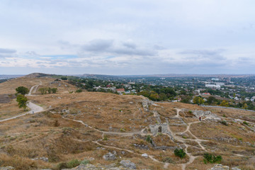 Kerch city and port from the height of the observation deck, in cloudy weather with clouds in the sky.