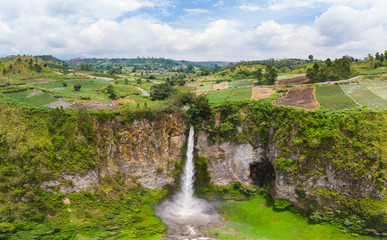 Aerial view Sipiso-piso waterfall in Sumatra, travel destination in Berastagi and Lake Toba, Indonesia.
