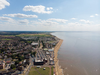 Fototapeta premium Aerial photo of the British seaside town of Hunstanton in Norfolk showing the coastal area and beach and alsop the caravan holiday park.
