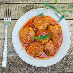 meatballs, tasty meat dish (ground meat, tomato sauce, vegetables) falafel. top food background. copy space