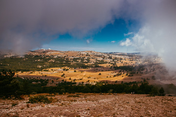 Ai-petri mountain in the fog. High mountain. Crimea. Russian mountains. Low clouds. Beautiful mountain landscape. The famous AI Petri mountain, partially covered with clouds, fog