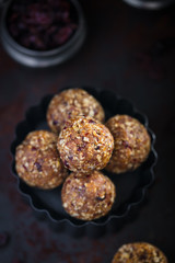 Raw, vegan energy balls with dried fruit and nuts. Healthy snack idea