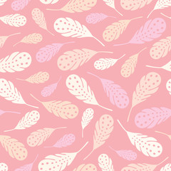 Seamless repeat pattern of tossed feathers in pinks and creams. A pretty vector nature background design.