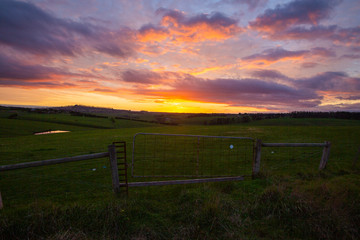 sunset over farmland