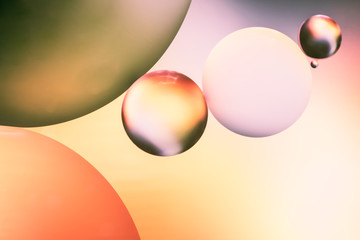 Pink and orange abstract background with bubbles