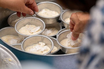 Group of Women Put Coconut Meat to Traditional Cuisine Banana Tart Dessert