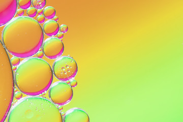 Orange and green abstract background with bubbles