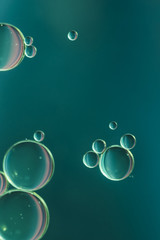 Dark turquoise bubbly abstract background