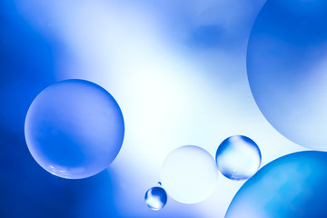 Dark blue abstract background with bubbles