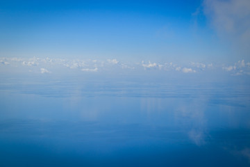Fototapeta premium Magic view from the top of AI-Petri mountain in Crimea, Russia on high rocks of Crimean mountains, black sea coast and blue sky with clouds. High mountains view