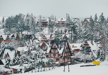 Tatra mountain landscape of zakopane with wooden cottages. Panoramic beautiful winter landscape view.