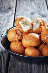 Jamaican Fried Dumplings in a black bowl