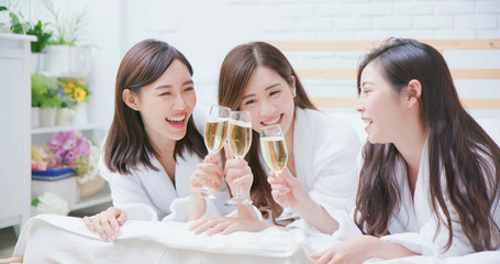 asian women friend have champagne