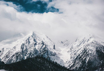 Fototapeta na wymiar The peaks of the Tatra Mountains in the snow.