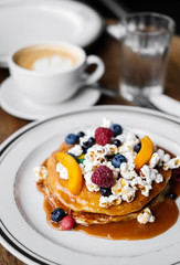 delicious breakfast with cupcake and fruit