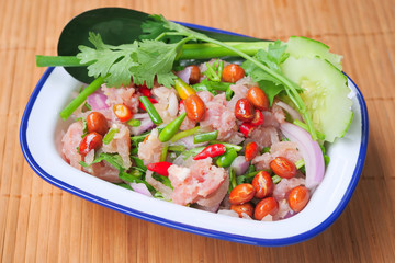 Thai traditional food fermented ground pork, fresh red and green chilli 