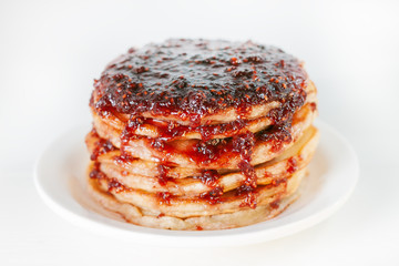 Classic american pancakes with raspberries jam