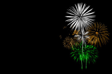 Green with Yellow and White Fireworks on Black background