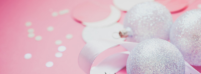Christmas pearl decoration balls pink background