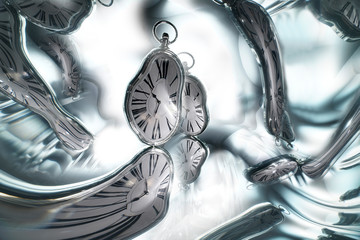 Reflection of the clock in the mirror surface. Concept: Time flows, changes, transforms.