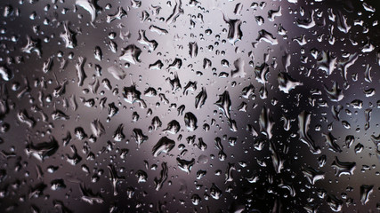 Raindrops on glass so close, background