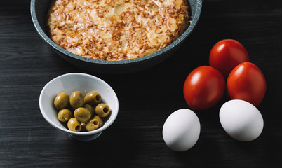 spanish omelette and olives on restaurant