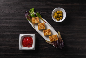 spanish omelette and olives on restaurant