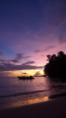 Fototapeta na wymiar Colourful sunset in Raja Ampat. Waigeo, West Papua, Indonesia