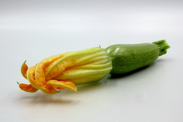 green zucchini isolated on white background