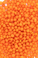 texture background red lentils isolated on white background