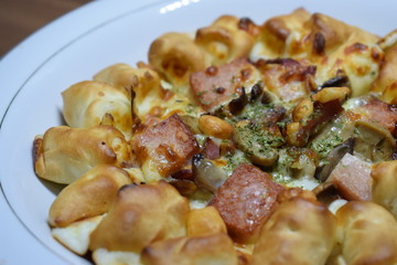 Cheese Meat Italian Pizza On Plate With Wooden Table In The Background
